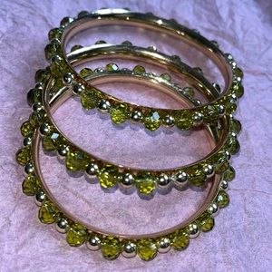 Set of three gold and green beaded bracelet